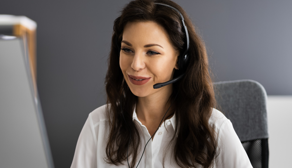 A lady wearing formal wear in an office representing a personal assistant 