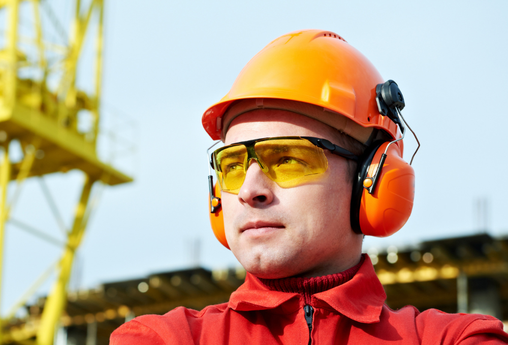 A man in safety wear representing a millwirght