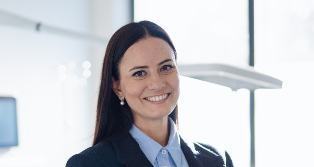 A woman in a suit representing a technical director